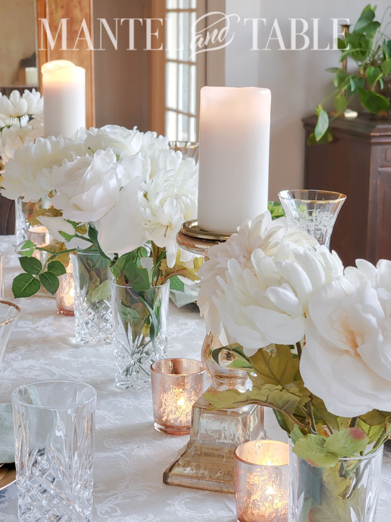 St Patrick's Day tablescape with white flower centerpieces in crystal glasses