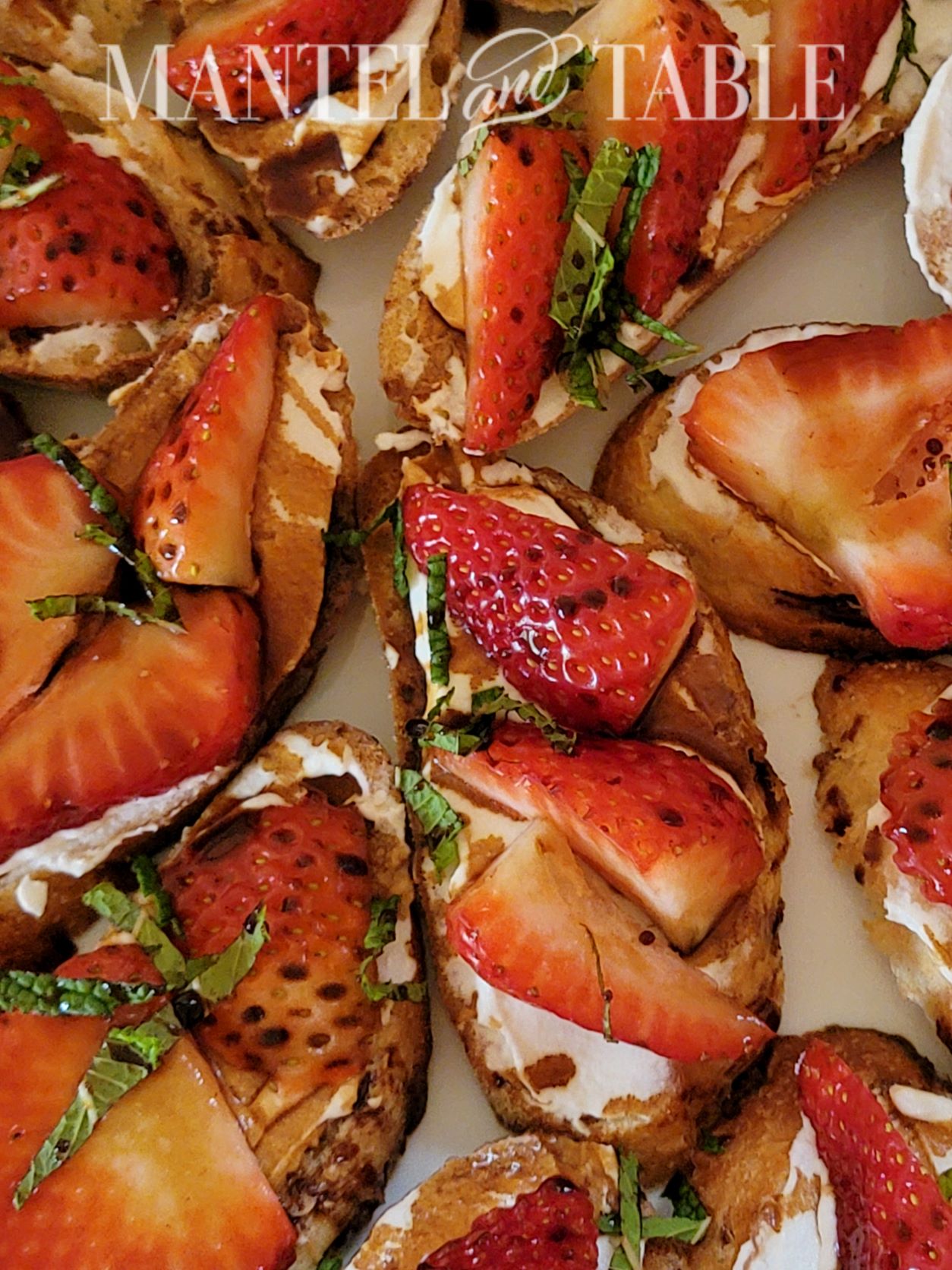 overhead view of Strawberry crostini with whipped ricotta and balsamic