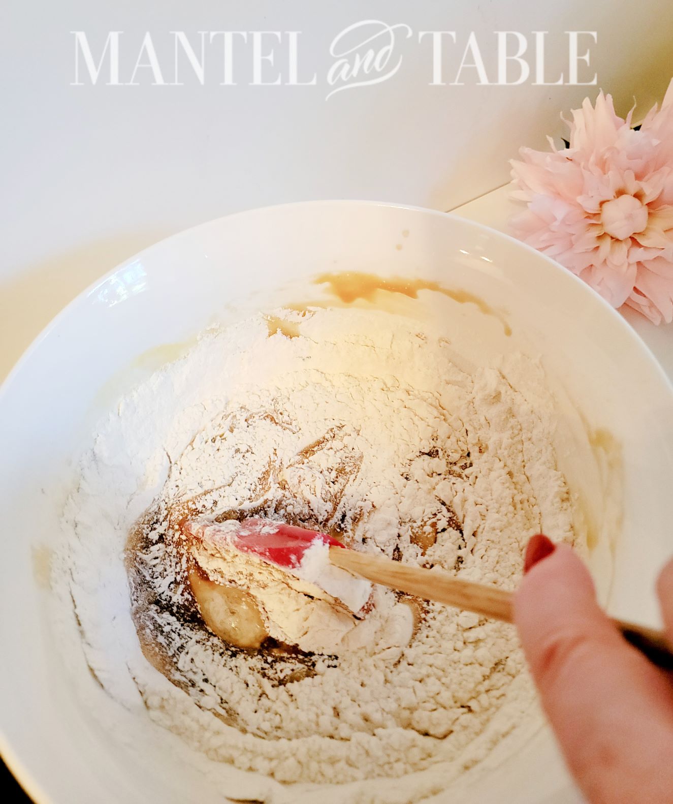 Mixing together dry and wet ingredients in a bowl