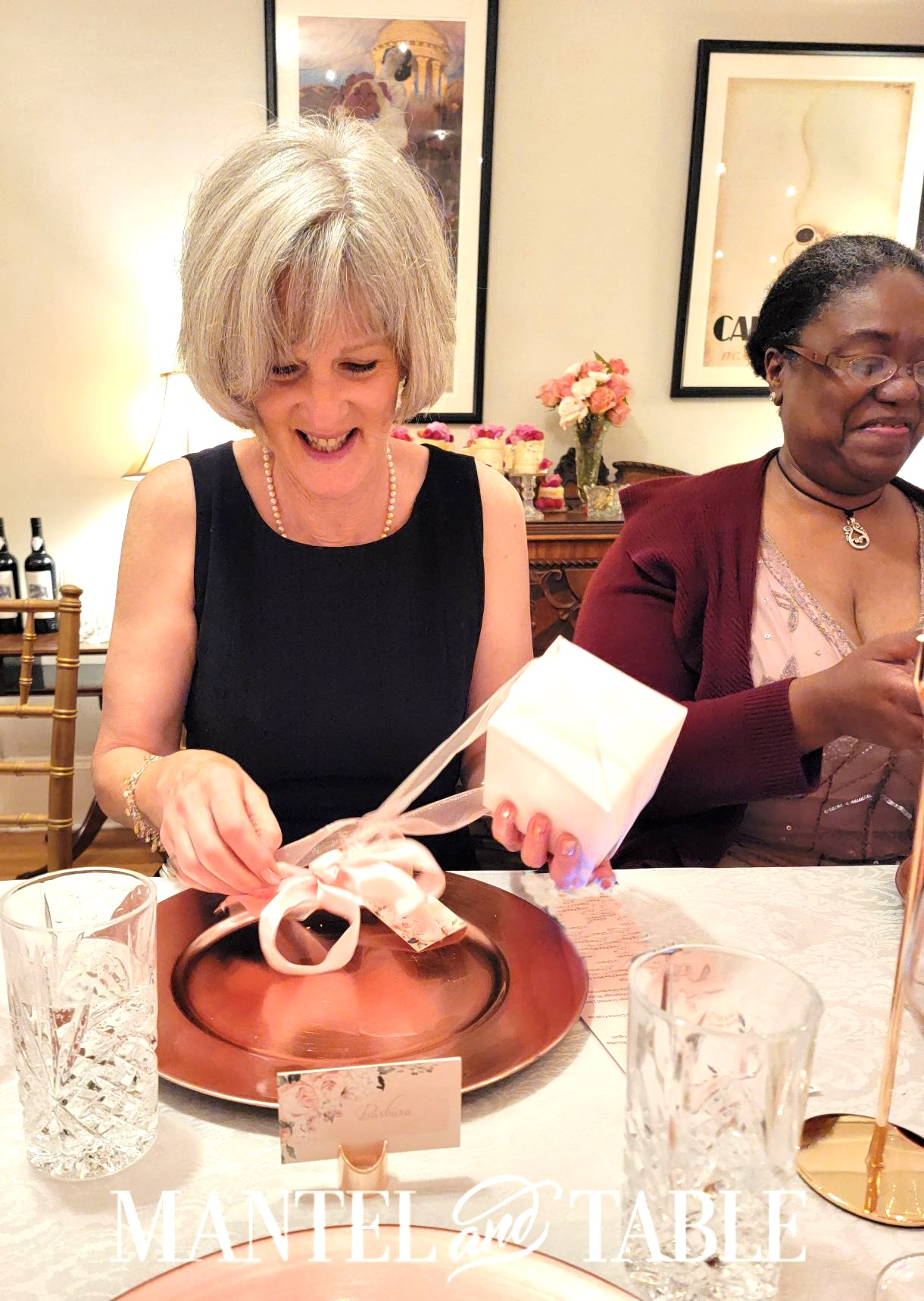 Ladies at a dinner party opening their RetroViewer
