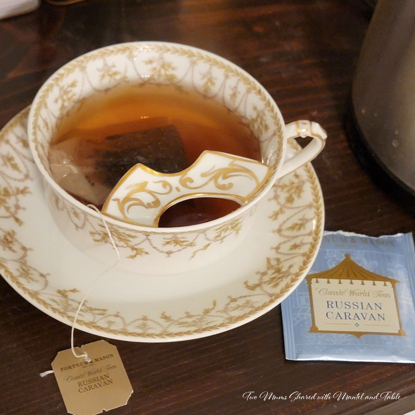 Gold and white teacup