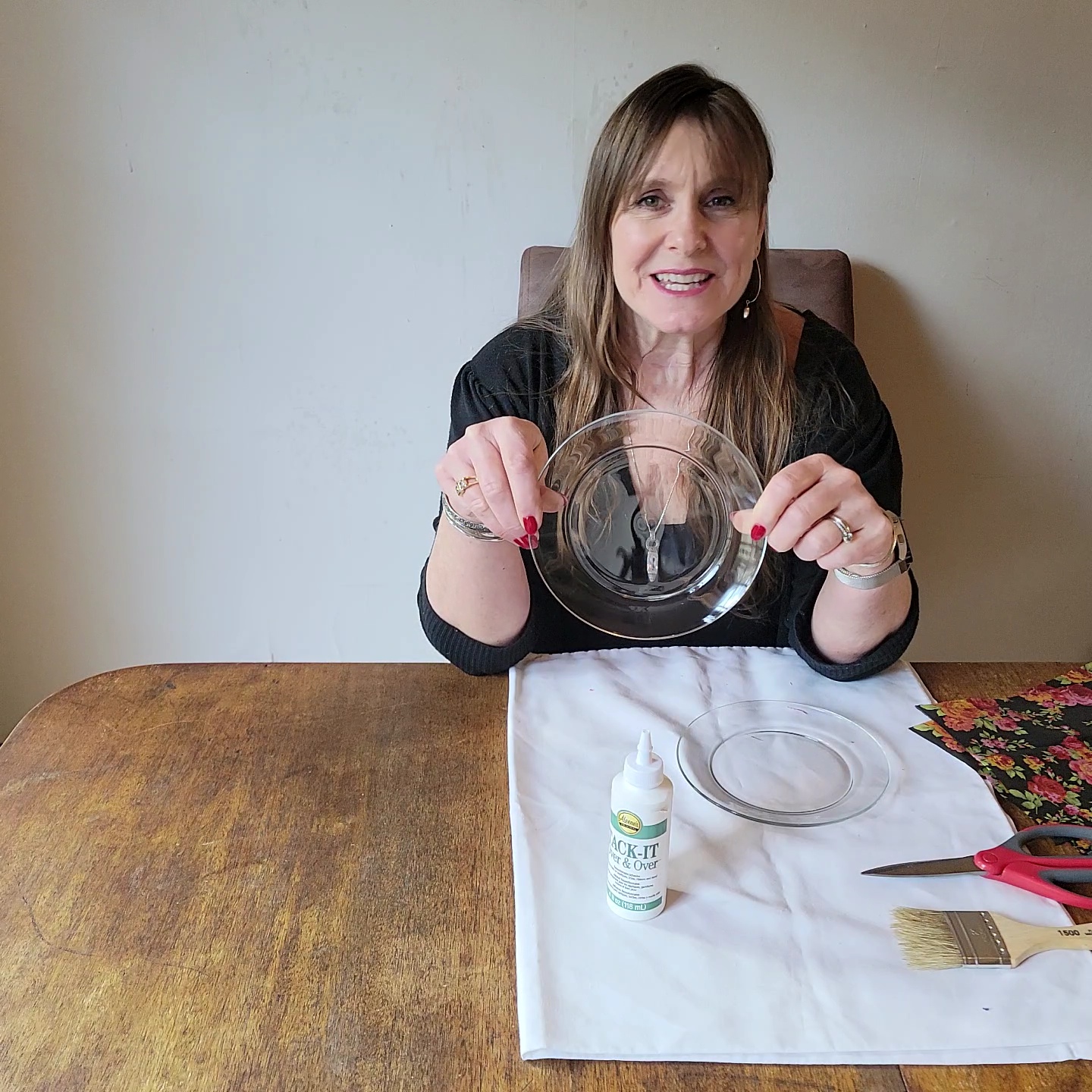 Two table setting problems solved! Woman holding glass plaste