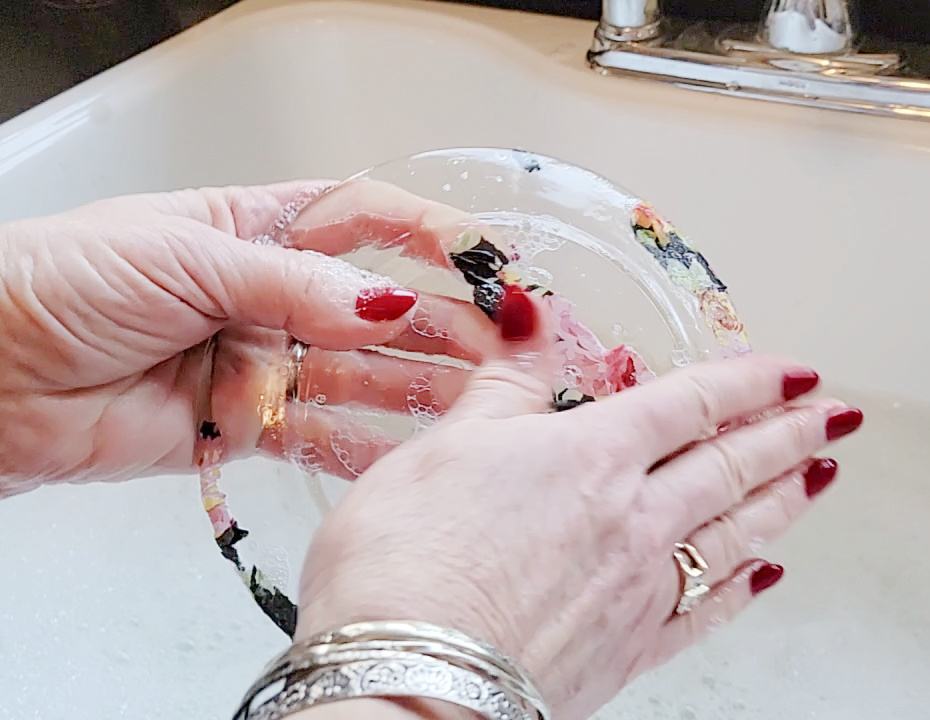 Wiping tissue paper off a wet plate