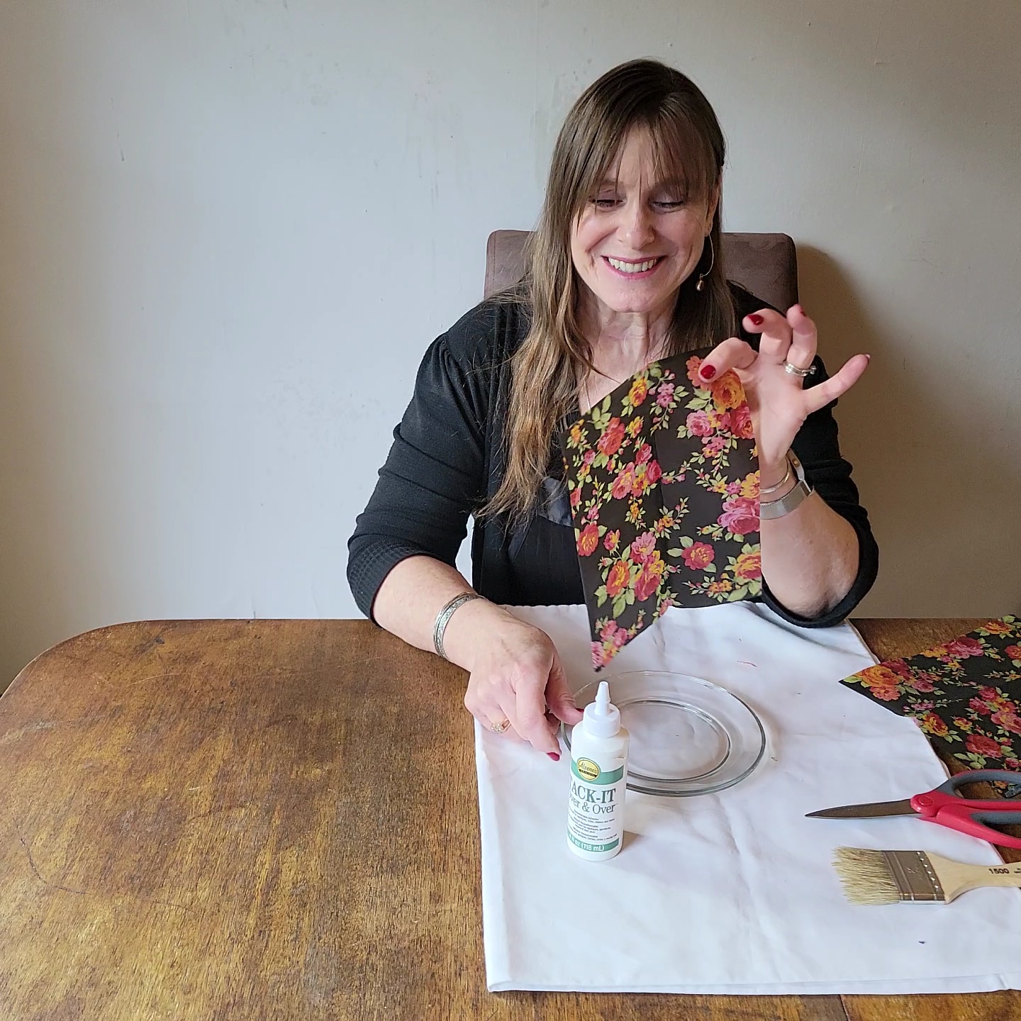 Two table setting problems solved! woman holding sheet of tissue paper