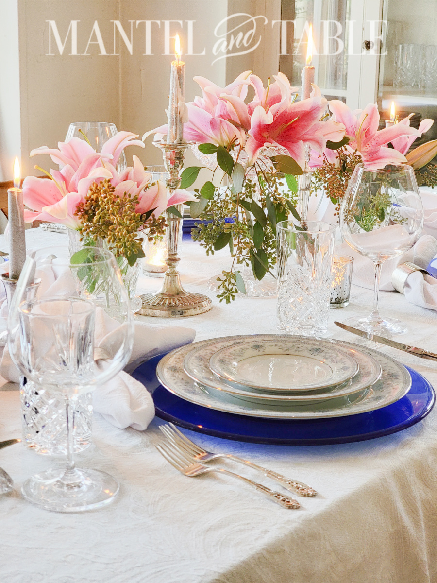 Blue table setting with pink flowers