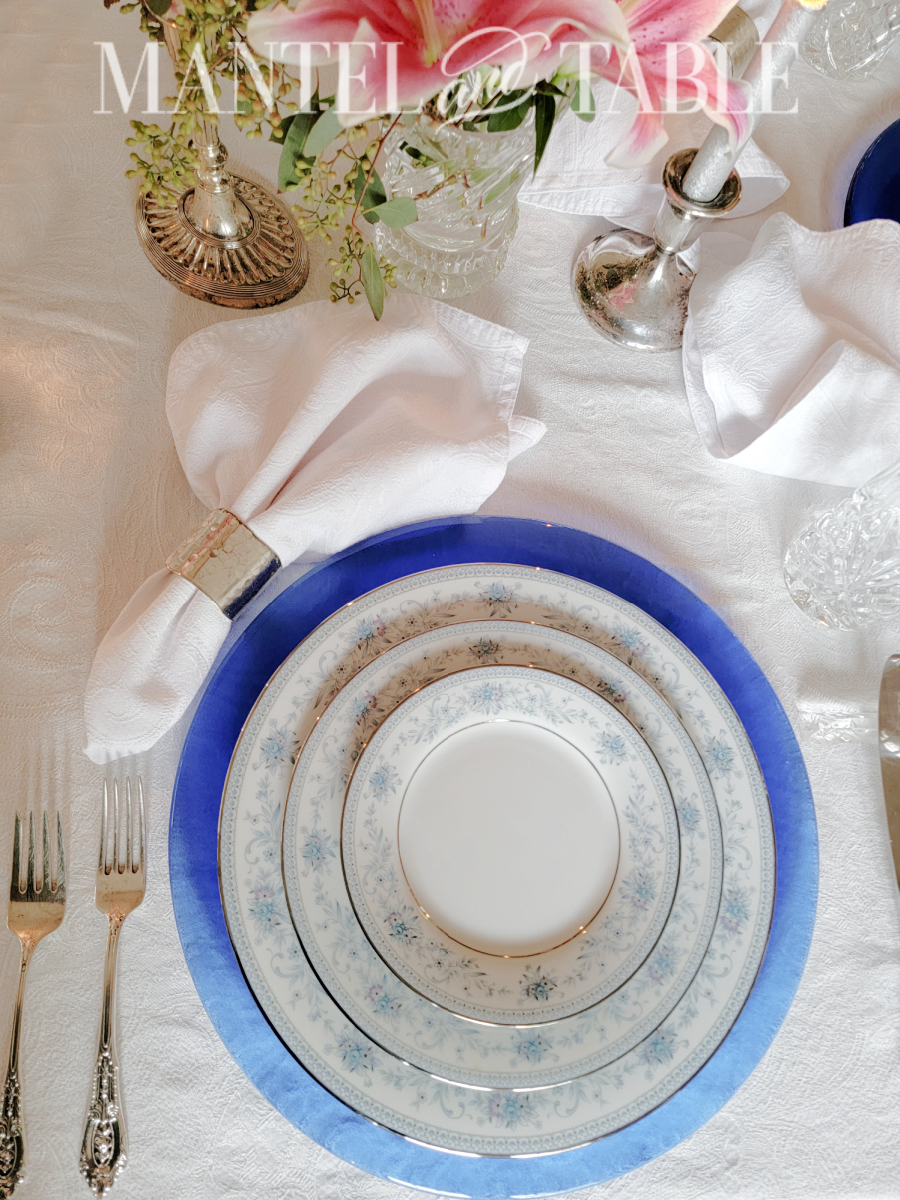 Blue table setting - plate stack closseup