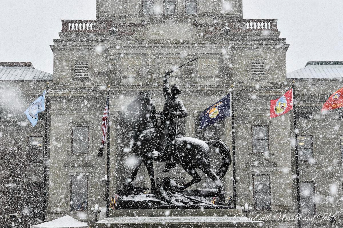 Horse and rider monument at the Helena MT capital in a snowstorm