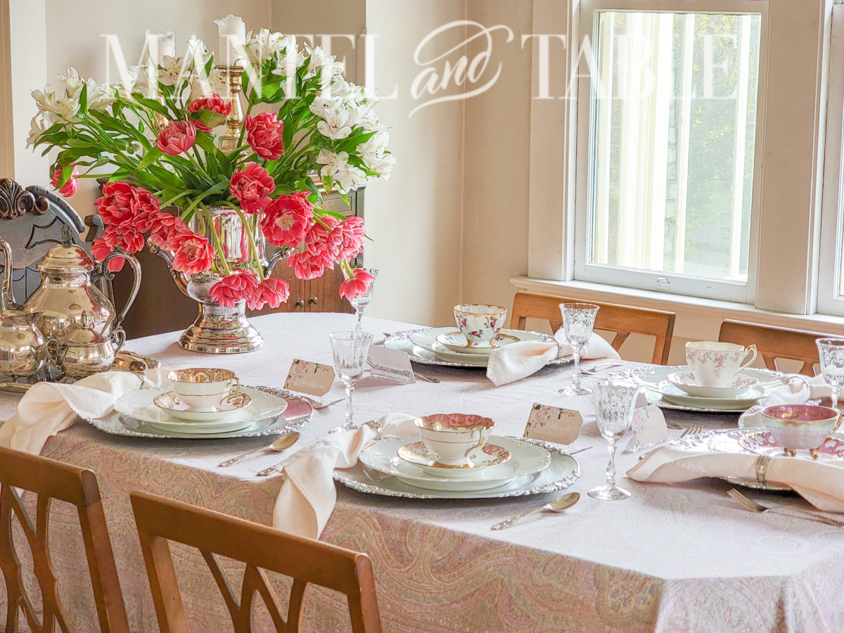 Organize a tea party - full table with flowers