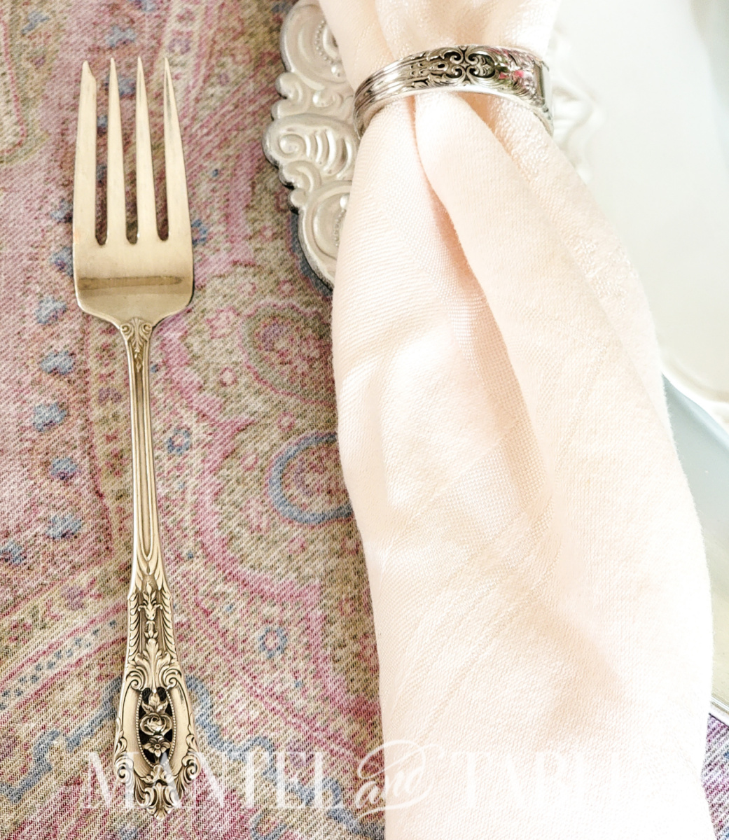Organize a tea party - Sterling fork and napkin ring closeup