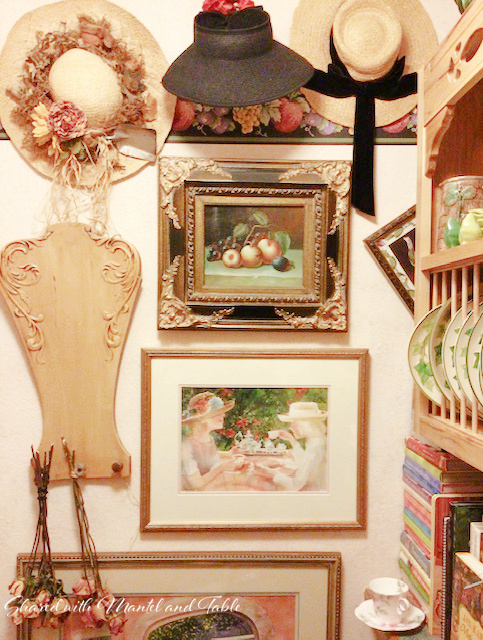 Teacup on the ranch - in the pantry with art, hats, dried flowers on the walls, and lots of cookbooks