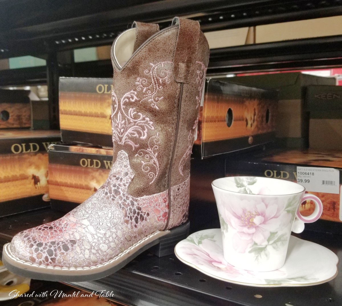 Teacup on the ranch beside a pink and brown cowboy boot in the shoe section of the store
