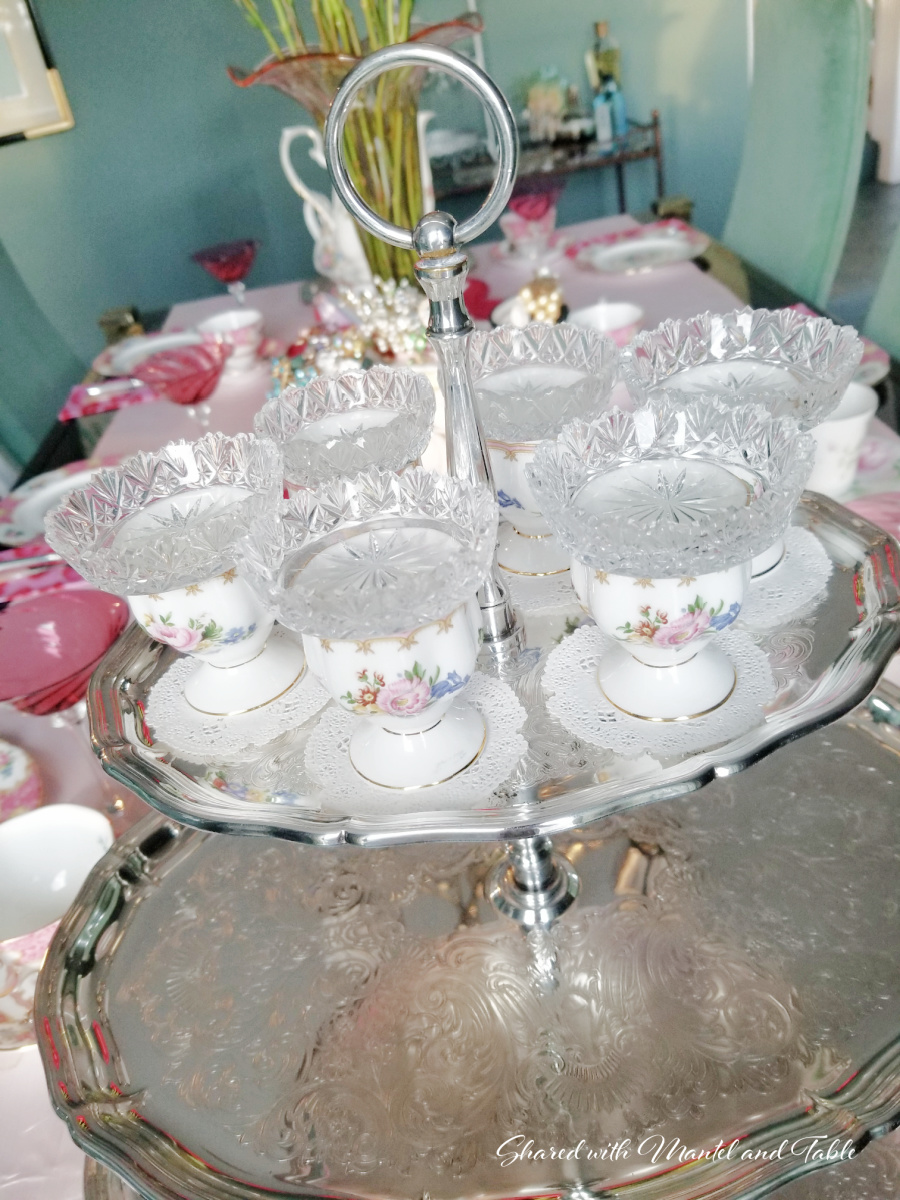 Silver tiered tray with porcelain dessert dishes