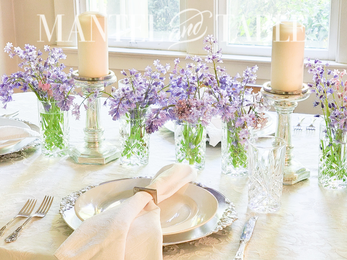 Spring tablescape - white inens and purple flowers