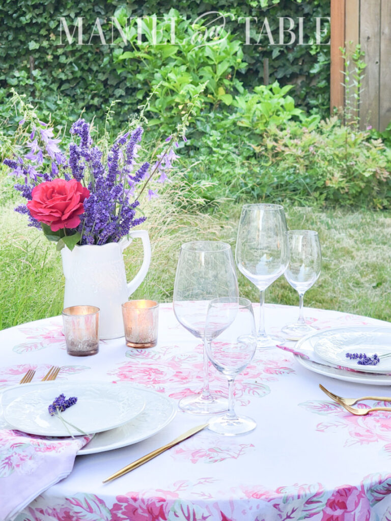 lavender bouquet centerpiece on outdoor table set for dinner
