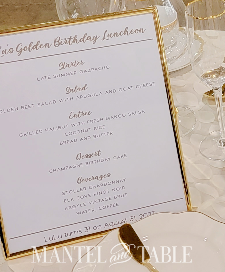 Luncheon menu in gold frame