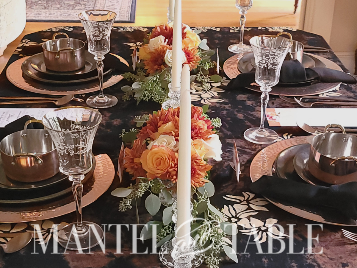 Copper fall tablescape - black Hawaiian patterned tablecloth
