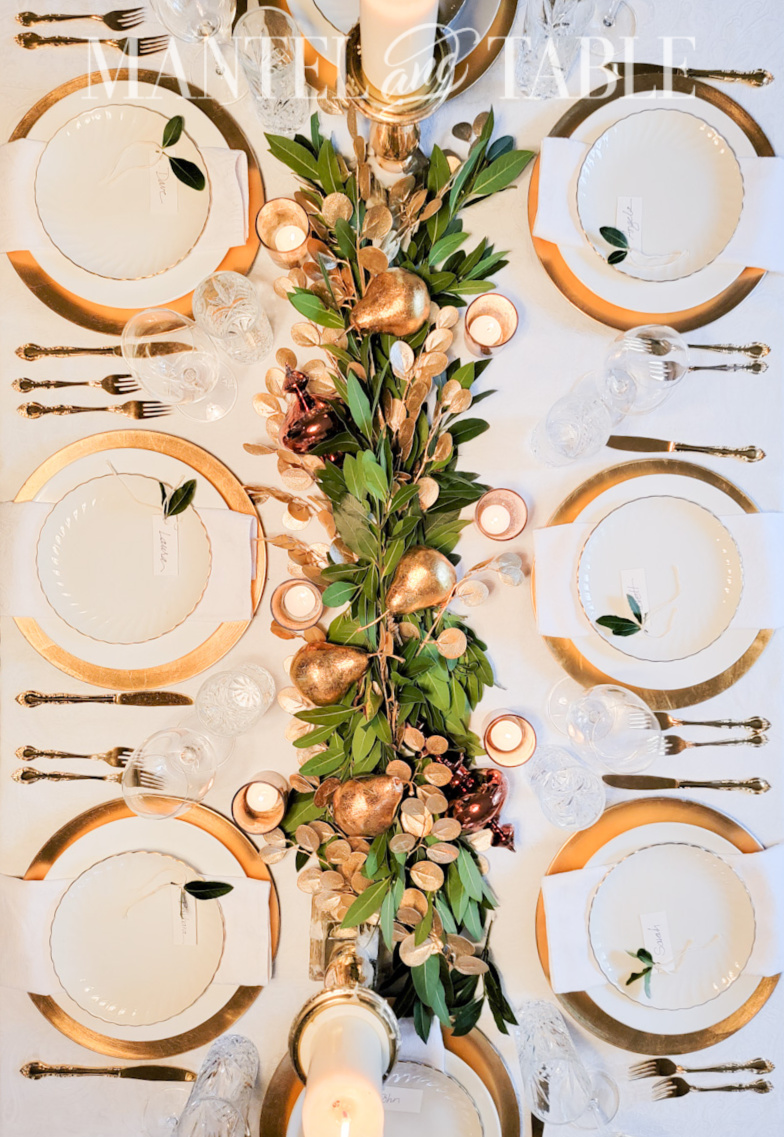 Gold and white table setting from above