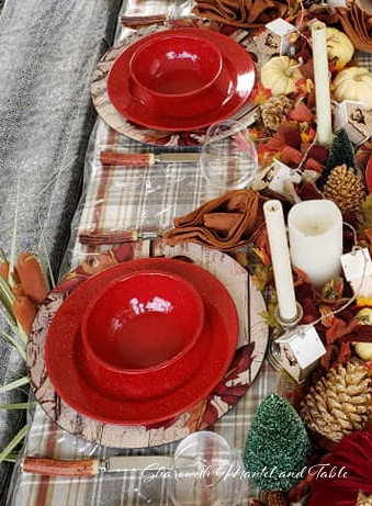 Closeup of place setting with autumn leaf charger plates