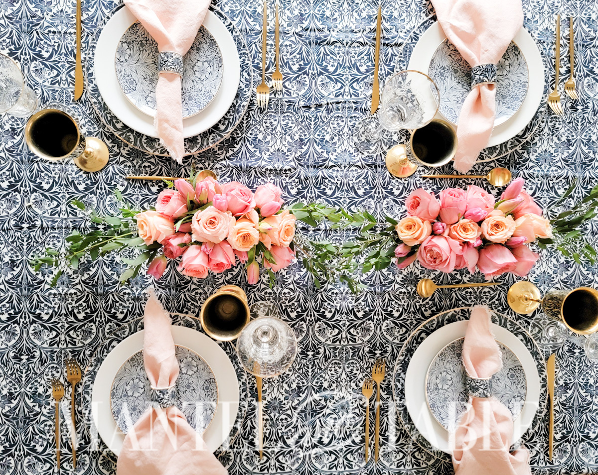 blue tablescape with pink rose centerpieces - overhead view