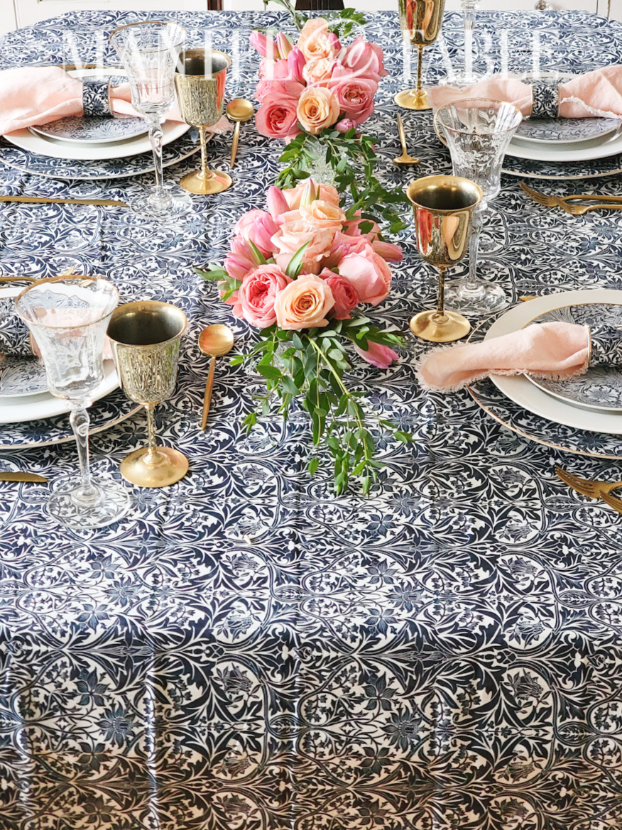 Blue tablescape featuring blue printed tablecloth