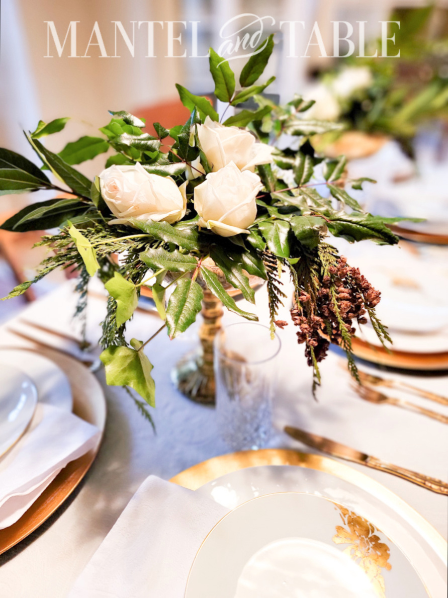 glamorous table setting, green centerpiece with white roses