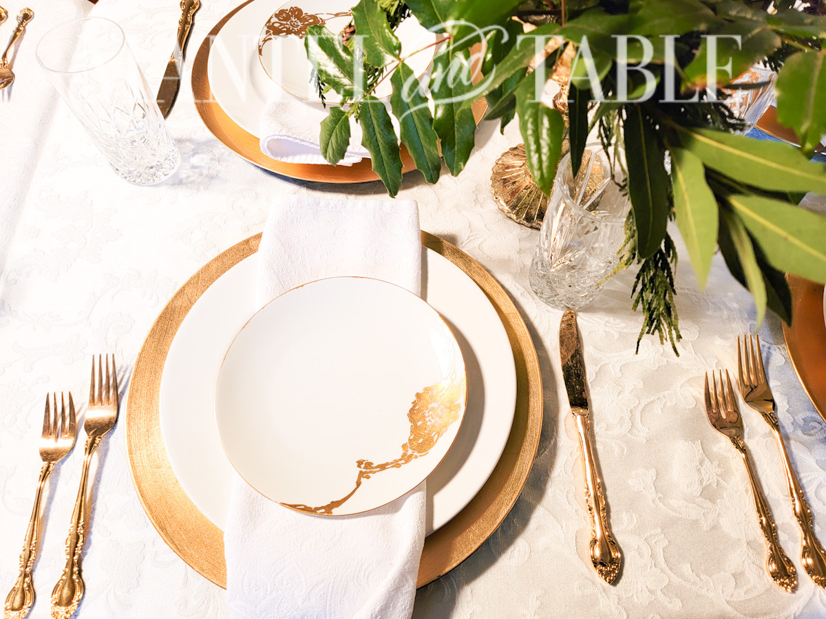 White and gold formal place setting
