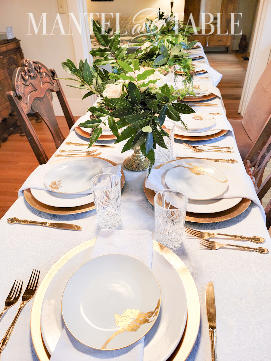 Side view down a long glamorous table setting