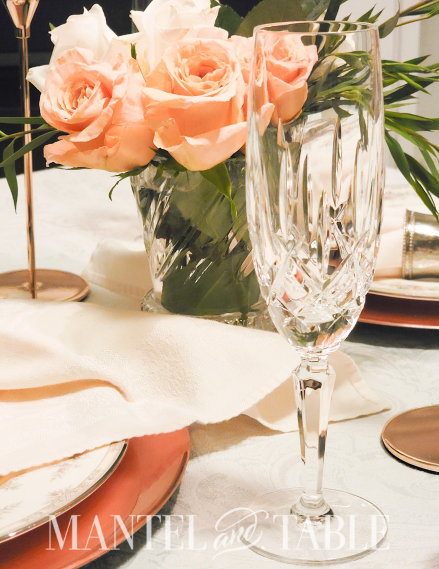 Closeup of crystal champagne flute on a formal table