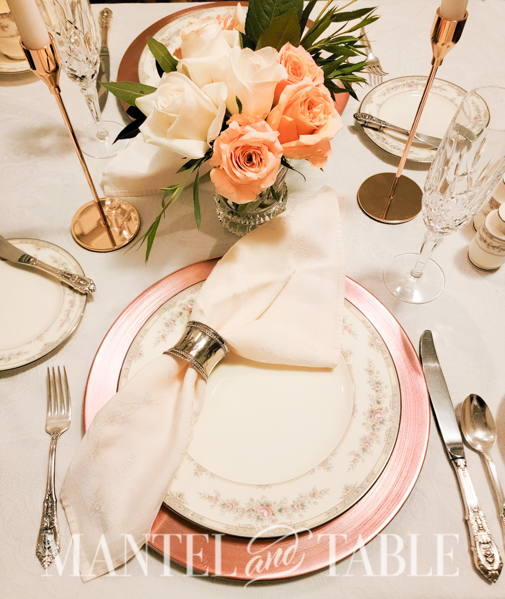 Closeup of formal place setting with silver flatware