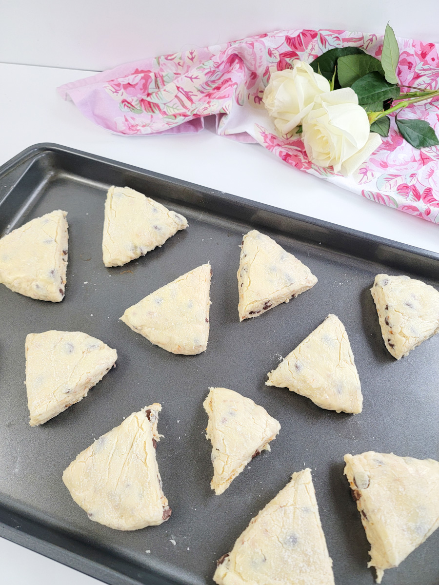 Scone dough triangles on baking sheet