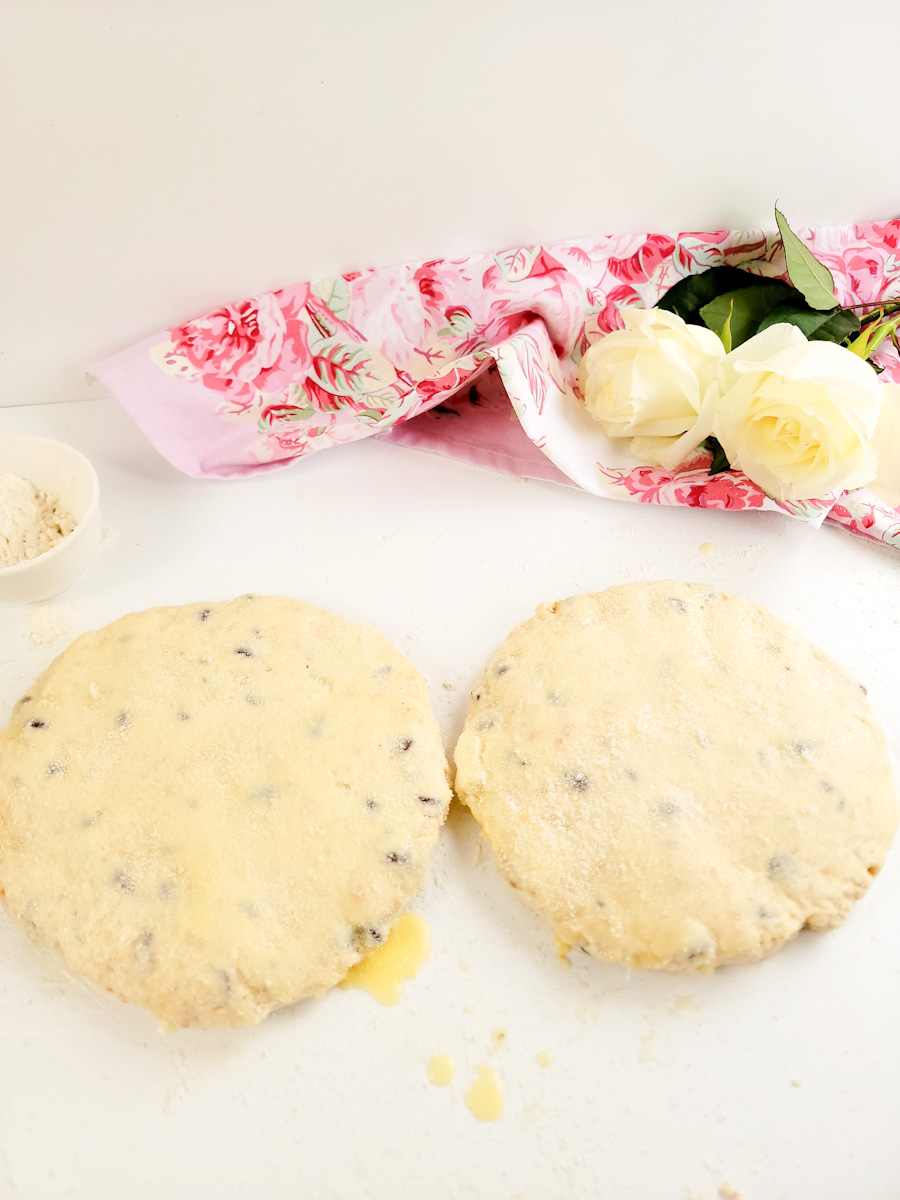 Dough rounds with glaze ingredients on top