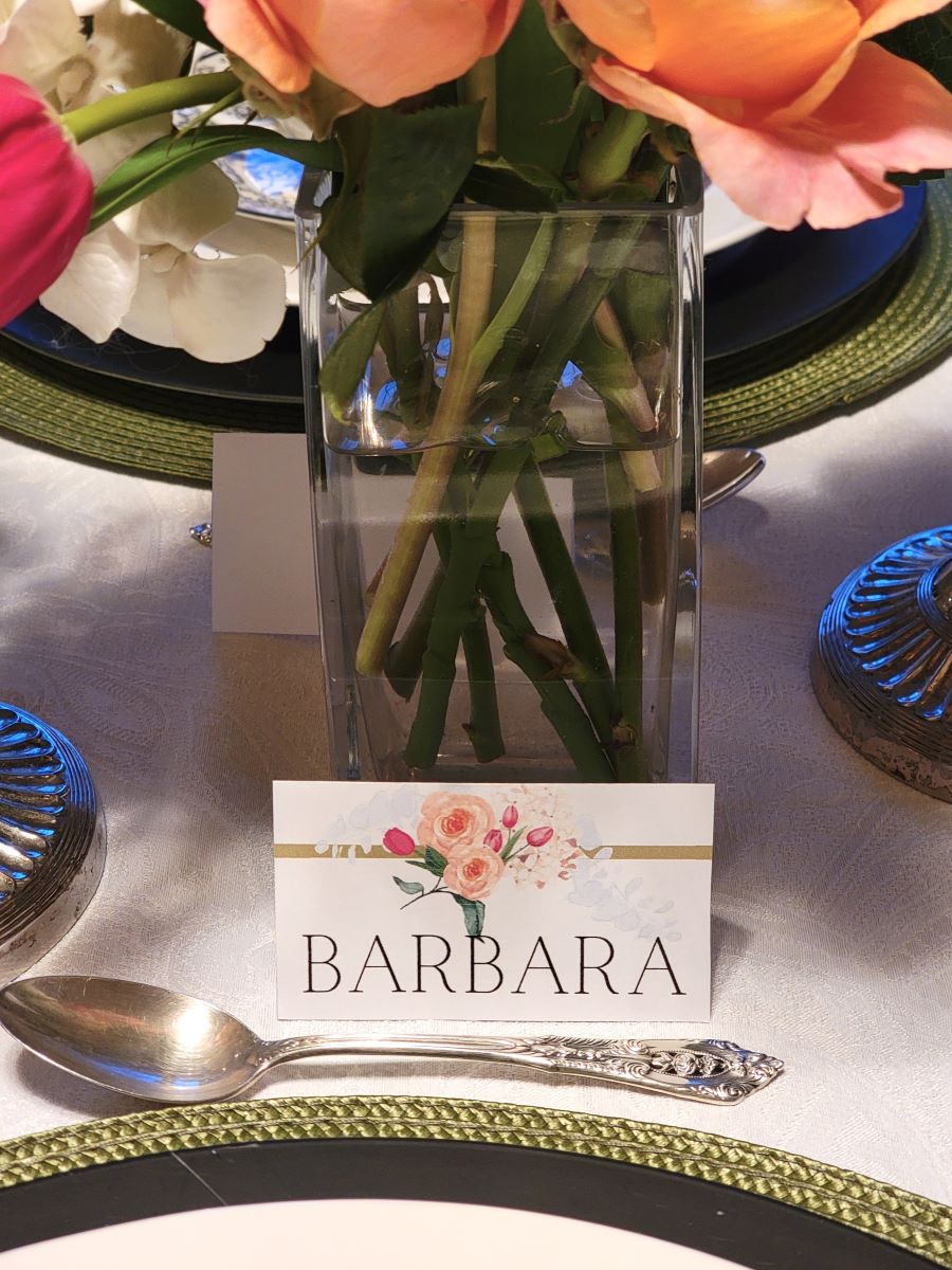 Pretty spring tablescape with closeup of place card