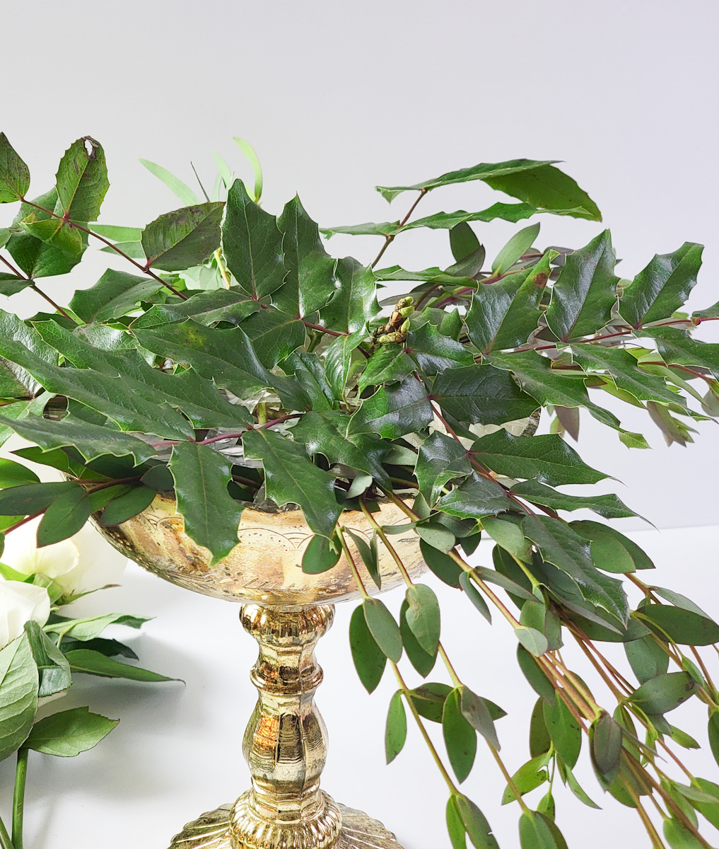 Lots of greenery as a base in a winter flower arrangement