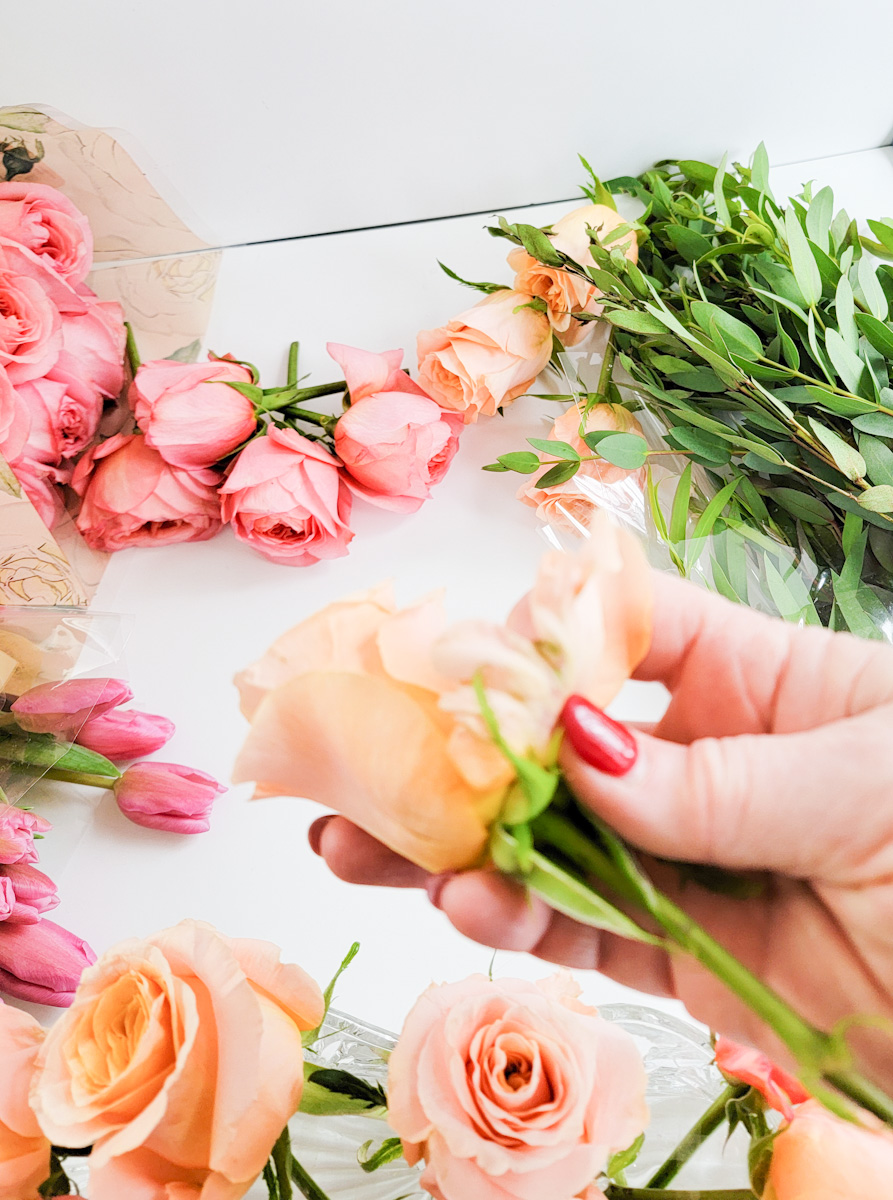 Closeup of removing outside rose petals