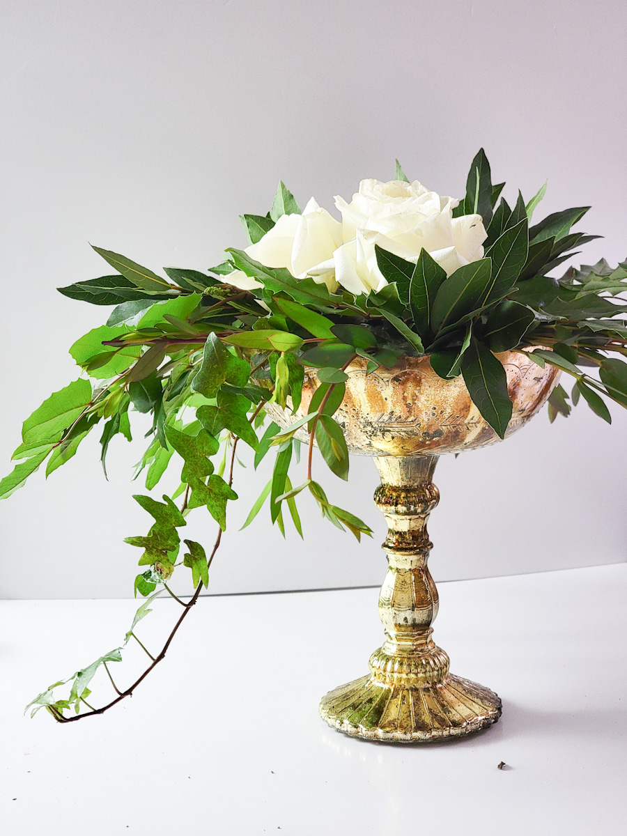 winter flower arrangement with trailing ivy