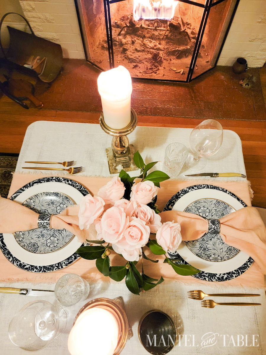 Peach and Blue Table Setting in front of a fireplace