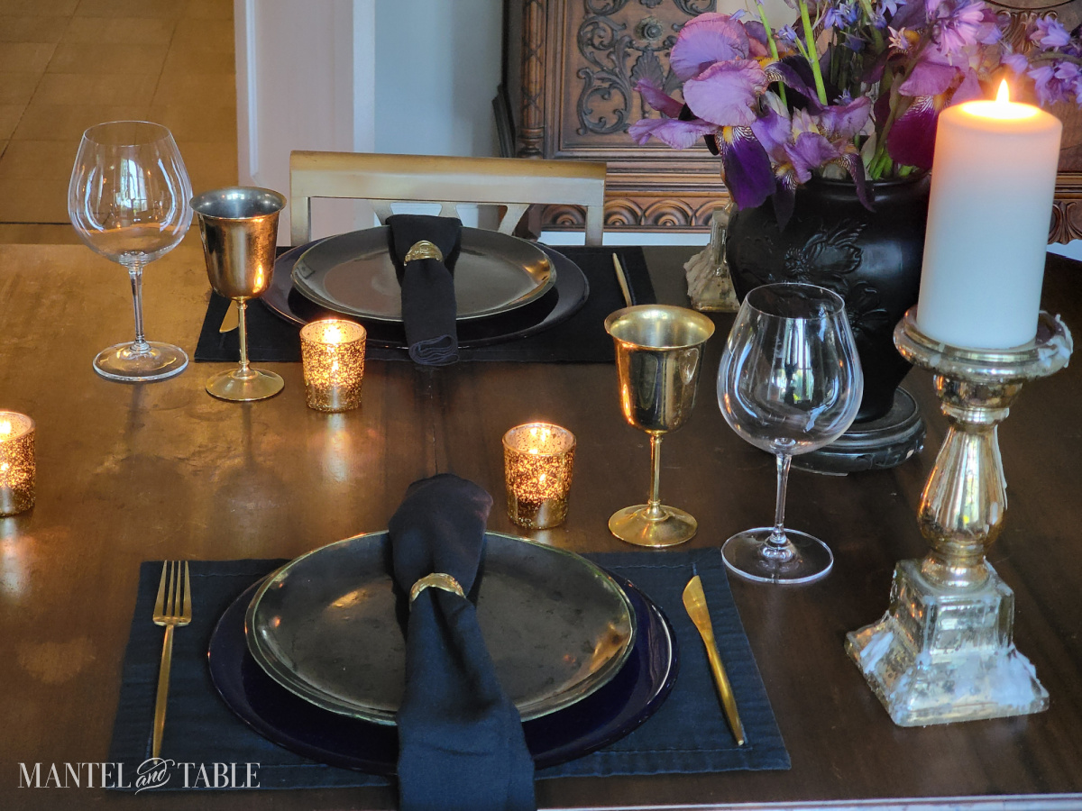 Dark and moody tablescape -featuring two place settings across from each other