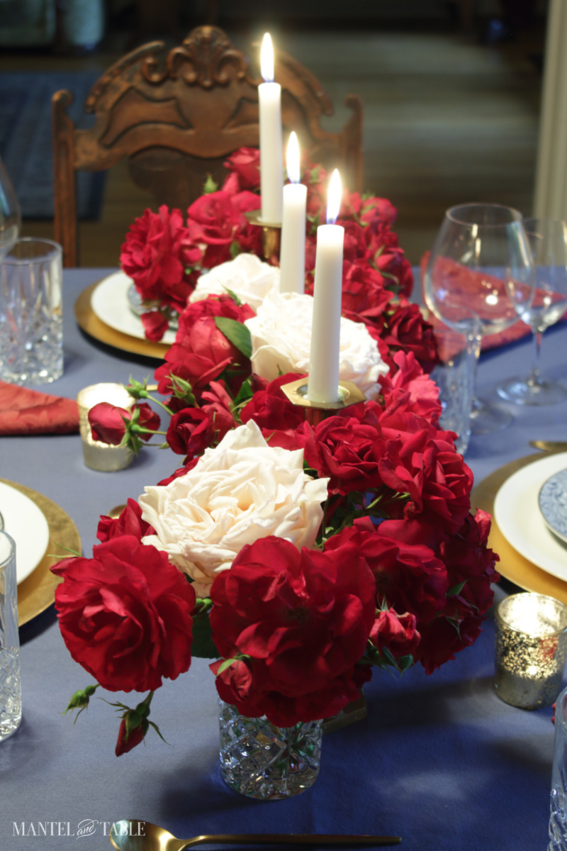 red white and blue table setting - rose centerpiece closeup