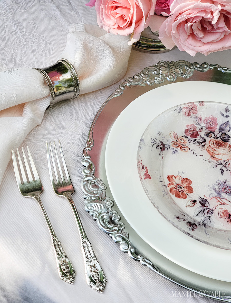 summer pink tablescape with a closeup of silverware