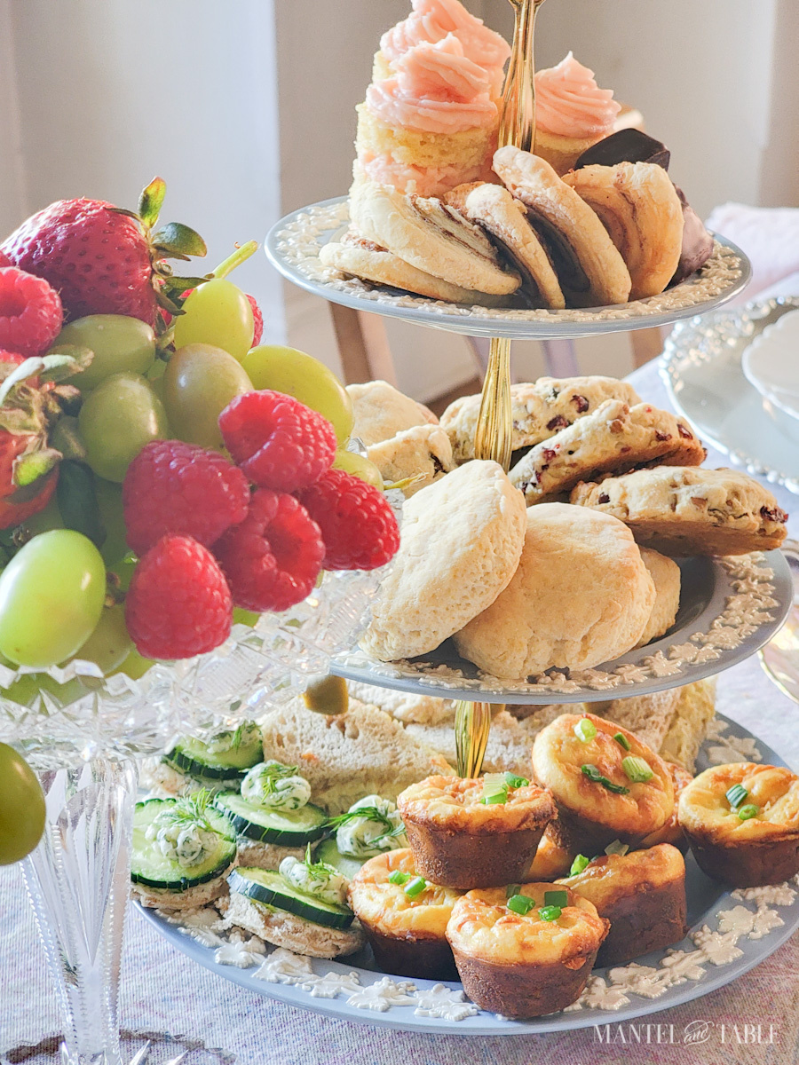 Tiered tray with tea party food, including easy cucumber sandwiches