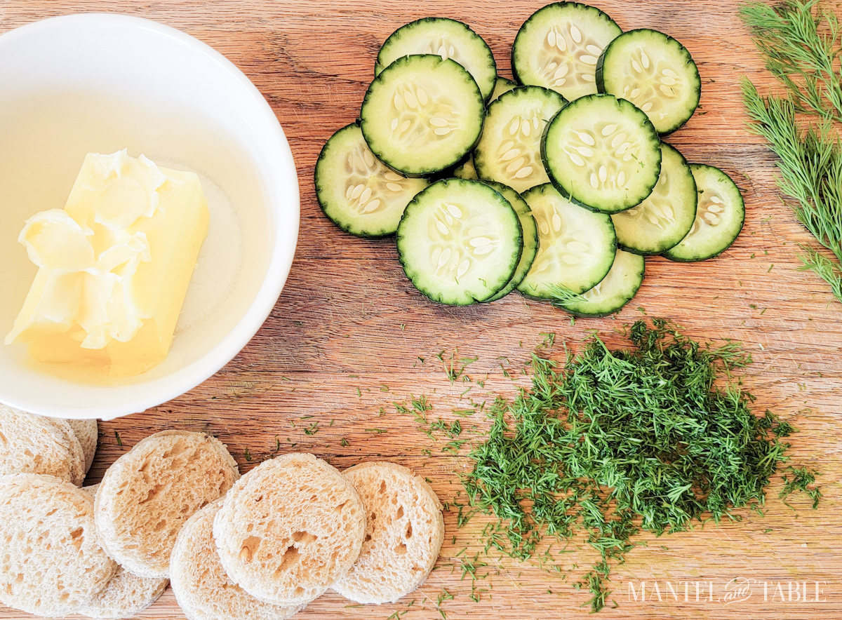 Ingredients for easy cucumber sandwiches on a cutting board