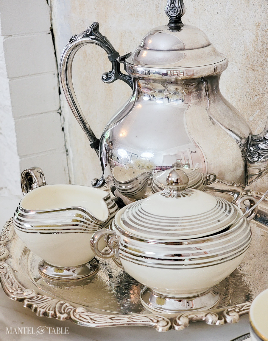 Afternoon tea pot, creamer and sugar bowl closeup