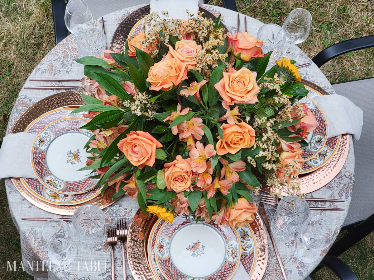 tablescape inspiration - fall table with peach floral centerpiece from above