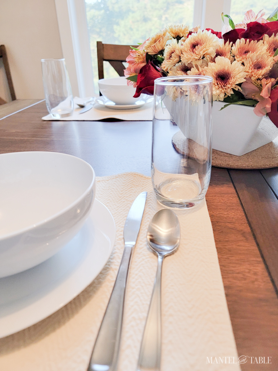 closeup of clear water glass in a place setting