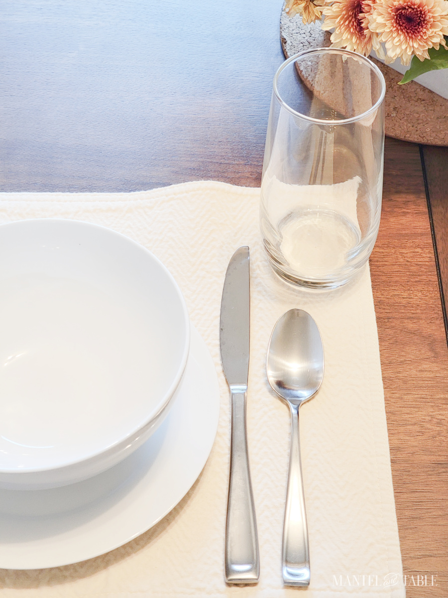 brunch table setting closeup of knife and spoon